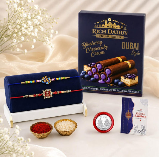 Raksha Bandhan Gift Combo – Peacock Rakhi & Blueberry Wafer Rolls